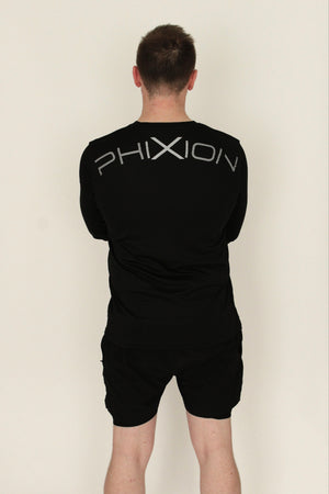 Back view of model in Phixion Active Long Sleeve T-Shirt. Features curved Phixion branding across the upper back.