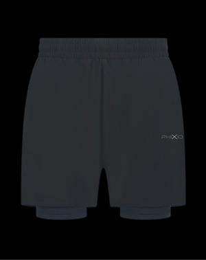 Phixion Twin Skin Shorts front product shot. Lightweight outer short with built-in compression layer, shown in black.